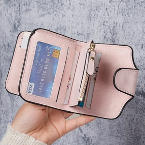 Women's minimalist pale pink bifold wallet with multiple card slots and zipper pocket