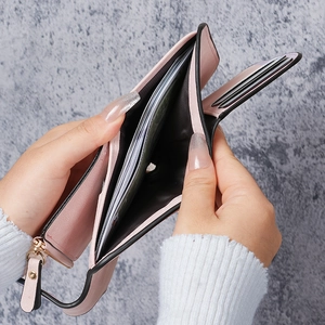 Minimalist pink leather wallet for women with multiple card slots and spacious compartments