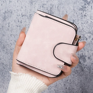Short pink matte bifold wallet for women with gold metal ring and snap closure