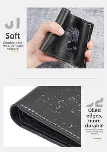 Detail of skull print wallet showing durable edge coating and soft leather texture