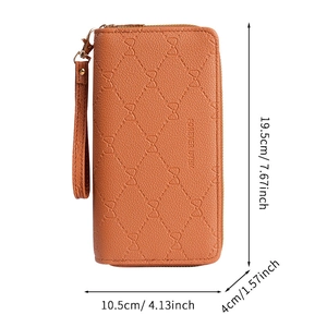 Bruine lange lederen portemonnee met strikmotief en maten 19,5 x 10,5 x 4 cm