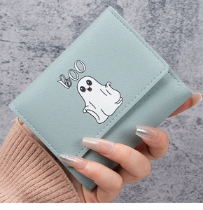 Close-up of a mint green leather wallet featuring a cute white ghost and BOO lettering