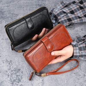 Fashionable long oil wax PU leather wallets in black and tan with wristlets