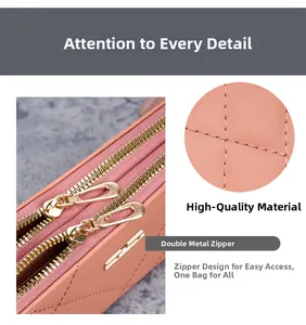 Detail of dual gold metal zippers and quilted leather texture on women clutch bag