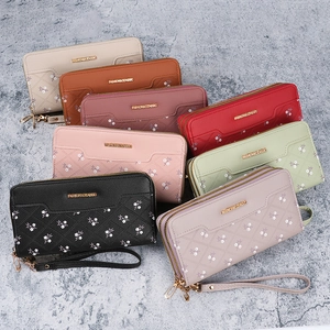 Quilted floral long wallets for women with wrist strap in eight assorted colors