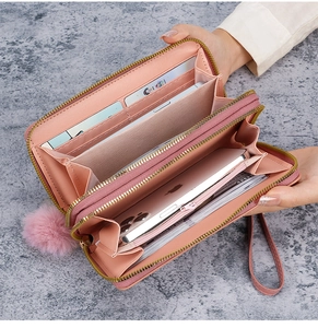 Pink V-quilted long wallet with double zippers, showing spacious card slots and phone pocket