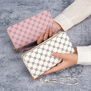 Zipper long wallet with geometric pattern and wristlet strap shown in two colors