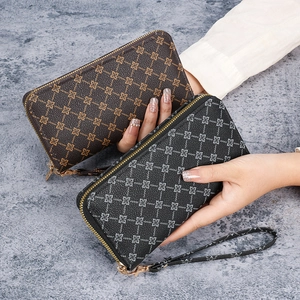 Elegant long zipper wallet for women with floral pattern and wristlet strap