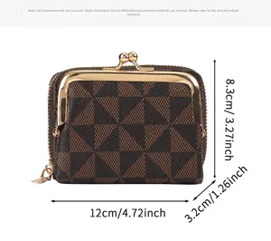 Detailed view of brown geometric wallet showing dimensions 12x8.3x3.2 cm with gold hardware