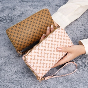 Brown and pink PU leather clutch bags with geometric flower print and wrist strap
