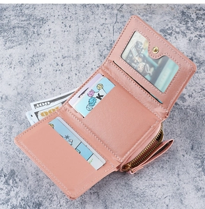 Detail of pink PU leather wallet showing card slots, photo holder and zipper pocket