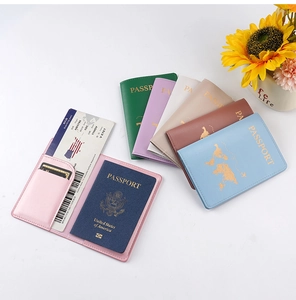 Detail of the internal card slots and boarding pass holder in the leather passport cover