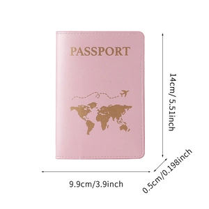 Pink PU leather passport holder with gold world map and aircraft embossed design