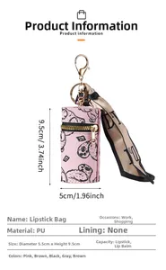 Detail view of pink PU leather mini pouch with puppy print, gold zipper, and silk scarf
