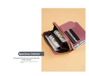 Detail of pink faux leather wallet featuring multiple card slots and a zipper coin pocket