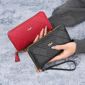 Portefeuille long élégant en cuir PU avec motif gaufré et glands pour femmes