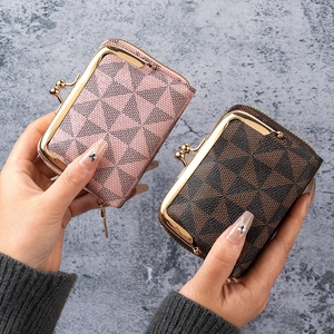 Minimalist vintage kiss-lock coin purse in pink and brown PU leather with geometric pattern