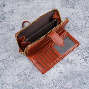 Portefeuille long vintage en cuir marron avec fentes cartes et poche zippée