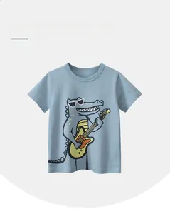 Close-up of soft cotton kids t-shirt with a cool crocodile playing guitar graphic