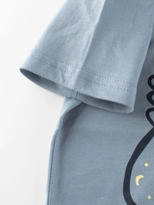 Kids light blue cotton t-shirt with dinosaur print featuring double-needle sleeve hem