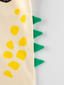 T-shirt enfant en coton beige avec pois jaunes et pointes de dinosaure 3D vertes
