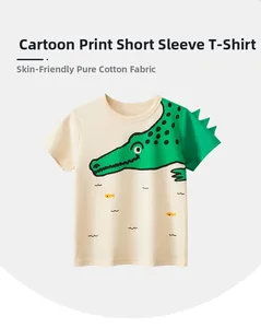 Detail of skin-friendly cotton T-shirt featuring a green cartoon crocodile print