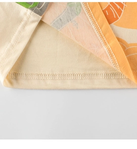 Detailed close-up showing the high-quality double-needle hem stitching on cotton t-shirt fabric