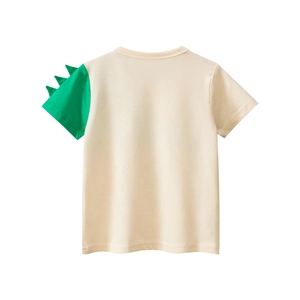 Detail of kids cotton T-shirt featuring 3D green dinosaur fin on the shoulder sleeve