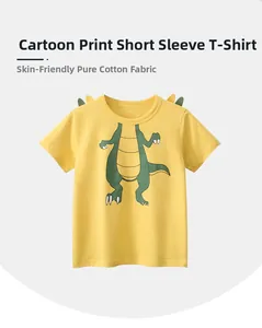 Detail of soft cotton kids t-shirt with cartoon dinosaur print and 3D fin decoration