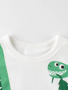 White cotton t-shirt for boys with green dinosaur print and vertical stripe detail