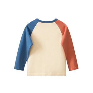 Detailed close-up of a kids' raglan long-sleeve tee with blue and orange contrast sleeves
