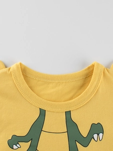 Kids yellow cotton t-shirt with green cartoon dinosaur print and crew neck detail