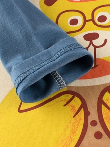 Kids long sleeve cotton T-shirt featuring a yellow cartoon print and bright blue sleeves
