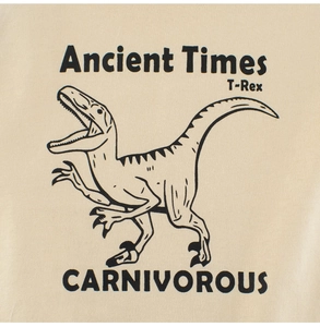 Detail of cream cotton fabric with black dinosaur T-Rex and Ancient Times print