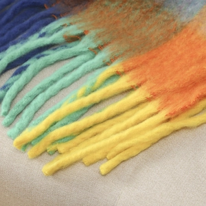 Multi-color gradient mohair scarf with oversized tassels and thick fringe detail