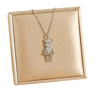 Hip hop style silver bear pendant necklace with white crystal inlay on champagne silk surface
