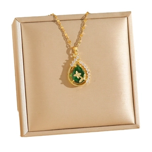 Green pear-shaped emerald pendant necklace with gold floral overlay and zircon detailing
