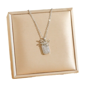 Sparkling bow pendant necklace in silver titanium steel with full rhinestones
