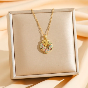 Luxurious gold heart pendant necklace with colorful crystal pavé and fine cable chain