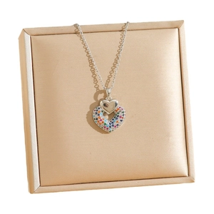 Rainbow zircon heart pendant necklace in titanium steel with a luxury tassel design