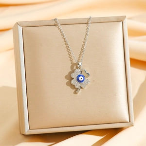 Silver sunflower four-leaf clover necklace with blue evil eye and white zircon inlay