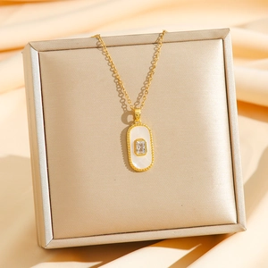 18K gold stainless steel necklace with shell and zircon pendant on champagne satin