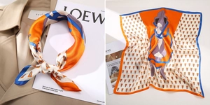Detailansicht eines Seiden-Vierecktuchs mit abstraktem Kunstdruck in Orange und Blau