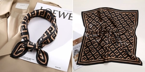 Macro detail of a black and champagne gold silk scarf featuring a geometric pattern