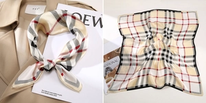 Close-up of silk square scarf featuring classic red and black plaid on beige fabric