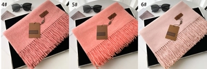 Three shades of soft fringe scarves with GERUNSI leather labels and stylish accessories