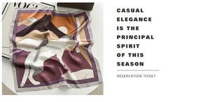 Detailed view of silk scarf featuring artistic cat and mountain illustration prints