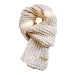 Thick cream knitted scarf for women with handmade leather label in minimalist style