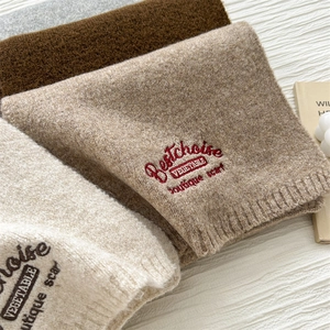 Knitted wool scarf with elegant letter embroidery in oatmeal, coffee and grey colors
