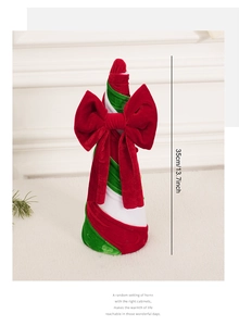 Détail du haut de sapin de Noël en velours rayé rouge et vert avec grand nœud, haut 35cm